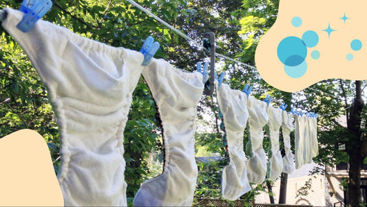 cloth diapers hang drying outside